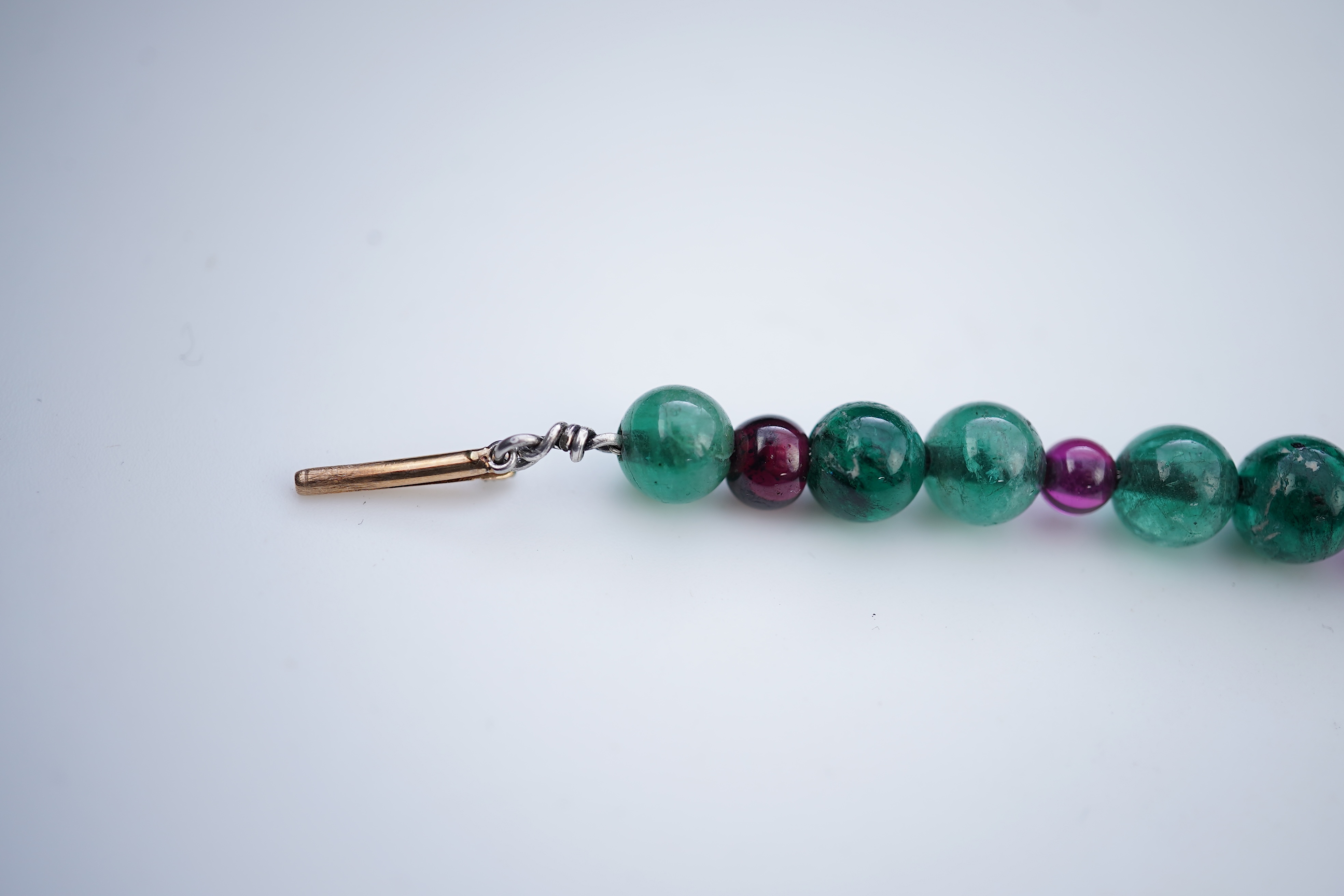 An Art Deco emerald, synthetic ruby and diamond bracelet, first half 20th century
